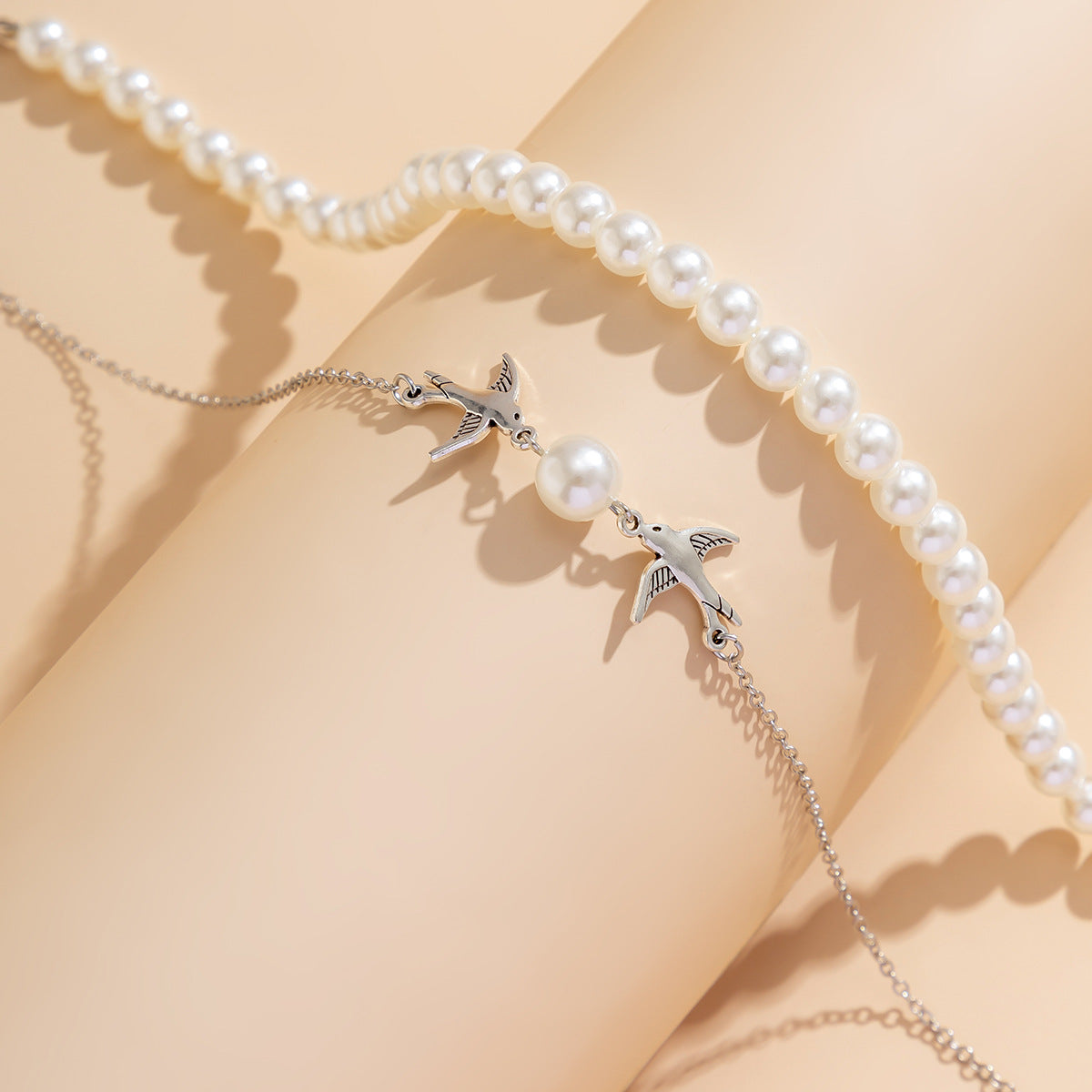 Bird With Pearl Necklace