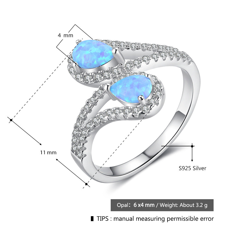 Anillo de ópalo azul aguamarina en plata de ley