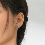 Close-up of a woman wearing earrings 