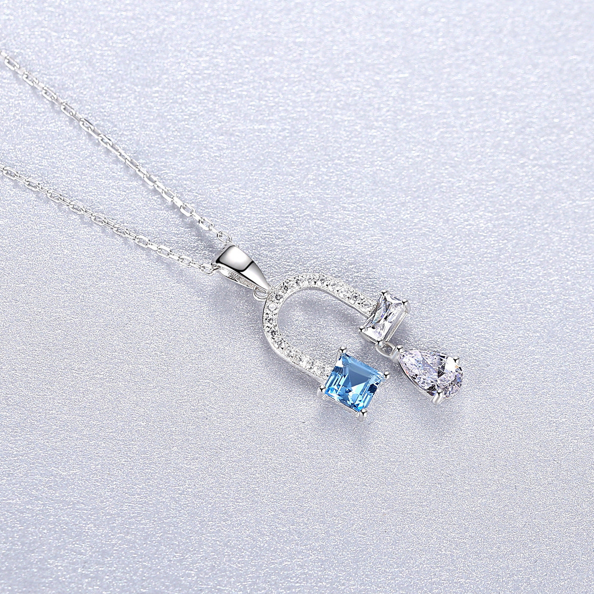 Blue Topaz Horseshoe Necklace