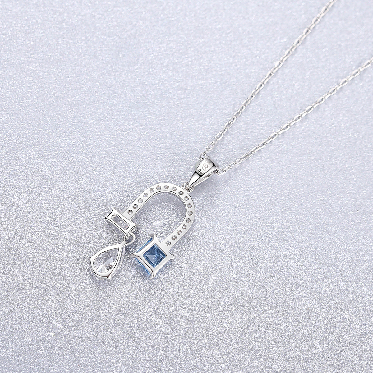 Blue Topaz Horseshoe Necklace