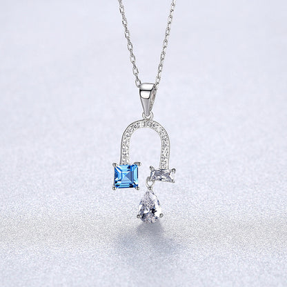 Blue Topaz Horseshoe Necklace