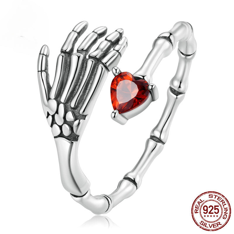 Bague ajustable en argent main-crâne-cœur