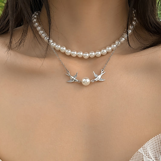 Bird With Pearl Necklace