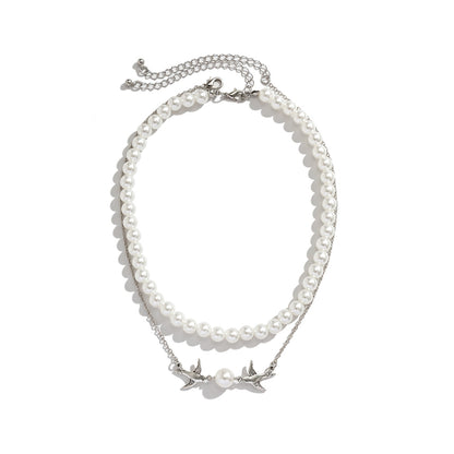 Bird With Pearl Necklace
