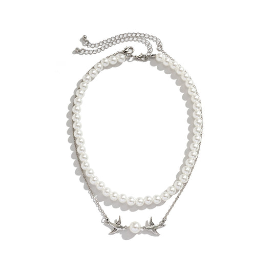 Bird With Pearl Necklace