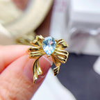 Bague nœud papillon en topaze bleue