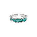 Anillo de plata de ley con diseño de ola del horizonte