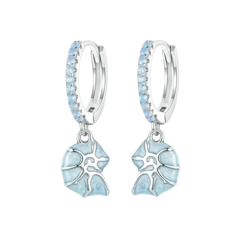 Silver earrings with blue floral designs on a white background