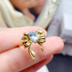 Bague nœud papillon en topaze bleue