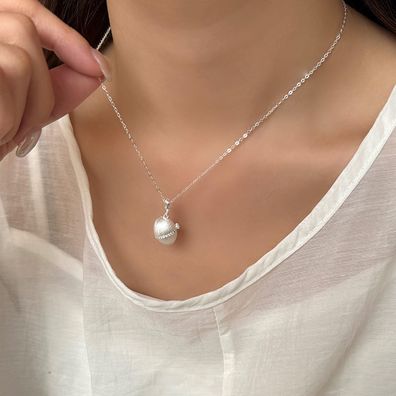 Mon œuf d'argent - Collier pendentif capsule vintage