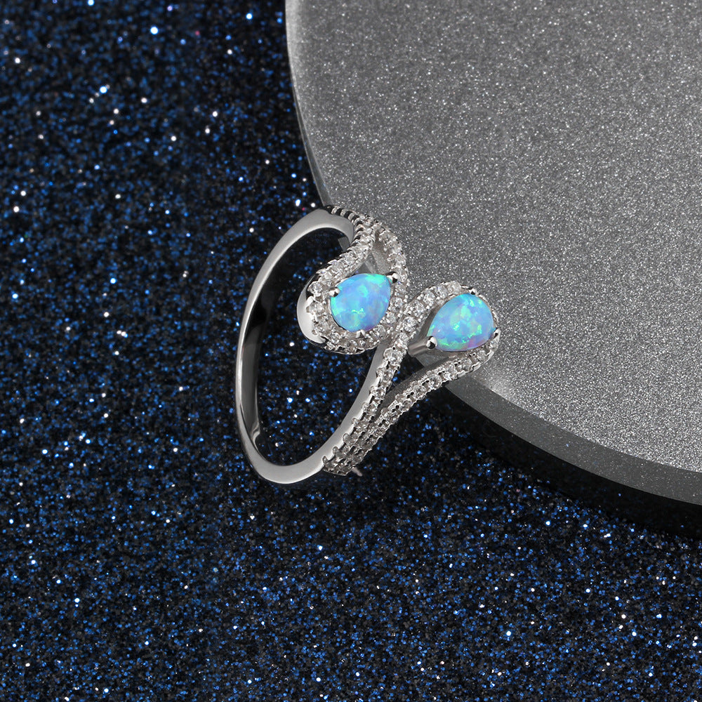 Anillo de ópalo azul aguamarina en plata de ley