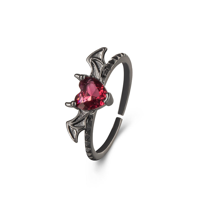 Anillo ajustable gótico rojo con ala de corazón 
