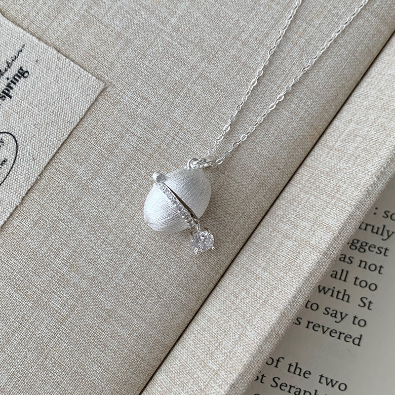 Mon œuf d'argent - Collier pendentif capsule vintage