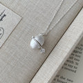 Mon œuf d'argent - Collier pendentif capsule vintage