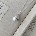 Mon œuf d'argent - Collier pendentif capsule vintage