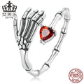 Bague ajustable en argent main-crâne-cœur