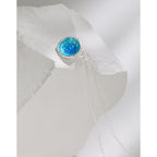 Collar de plata de ley con piedra marina y luz azul esmerilada