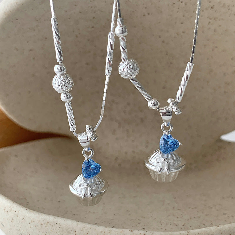 Pancake Sterling Silver Blue Zircon Pendant Necklace