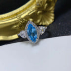 Bague réglable en topaze bleue taille marquise