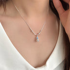 Pancake Sterling Silver Blue Zircon Pendant Necklace