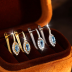 Boucles d'oreilles en argent sterling avec pierre précieuse porte-bonheur